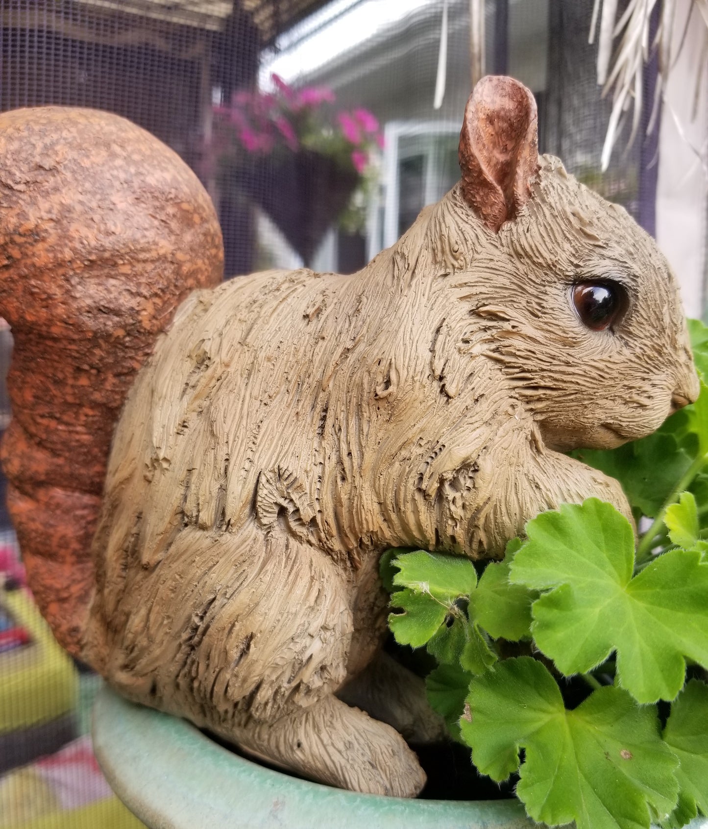 buy a squirrel statue at auction