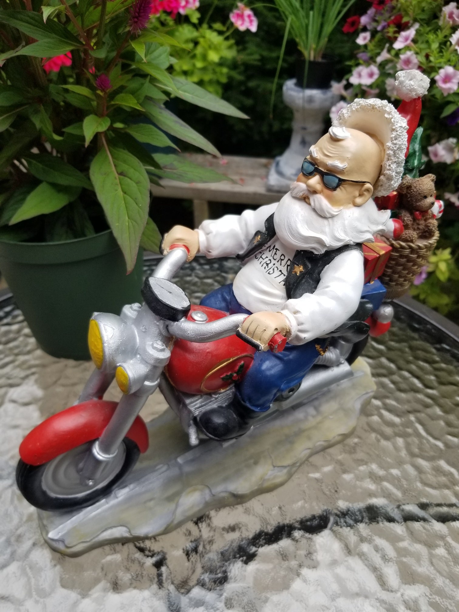 buy a riding santa statue at auction