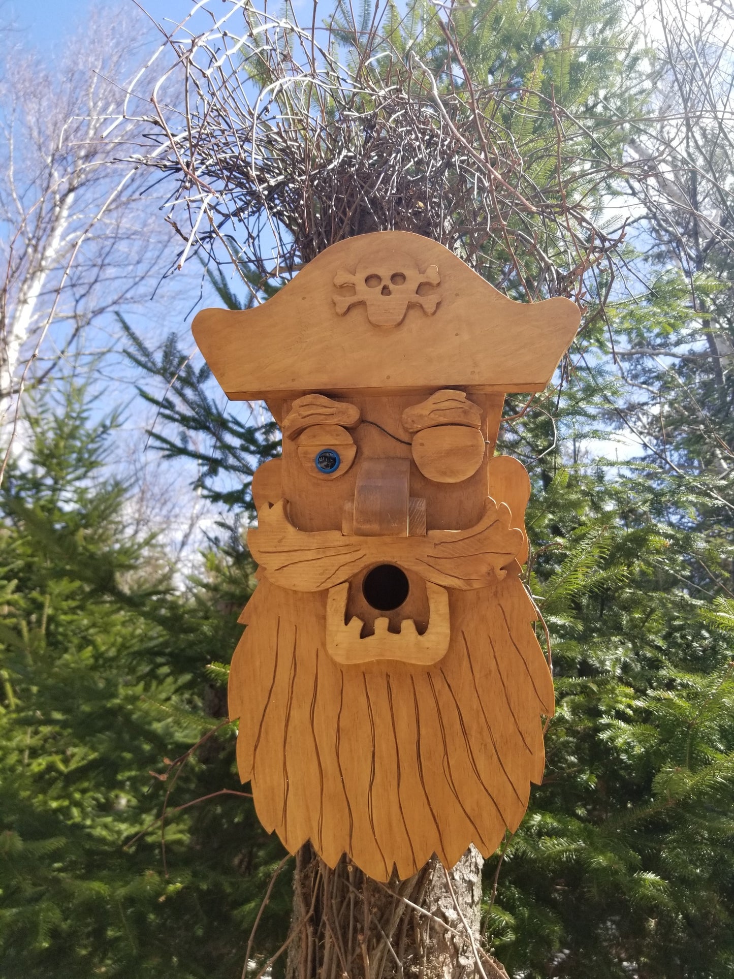 buy a wooden pirate statue at auction