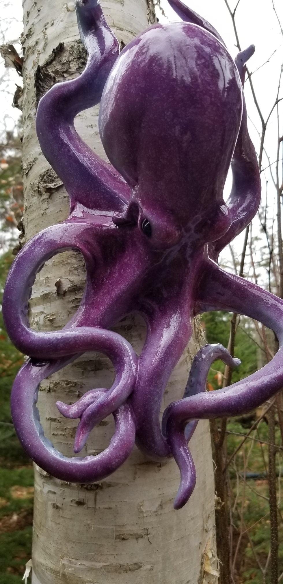 buy a purple octopus statue at auction