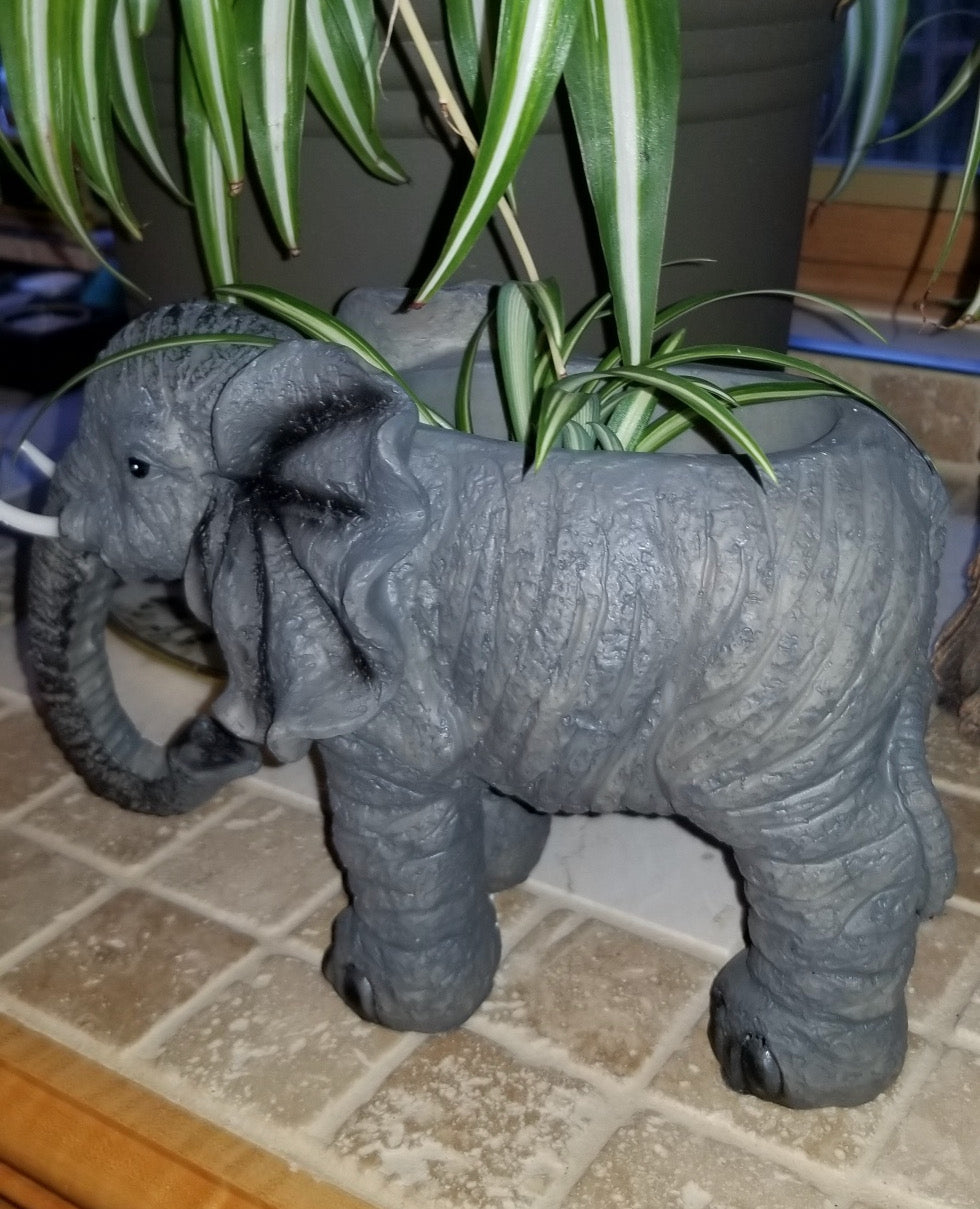 buy an elephant planter statue at auction