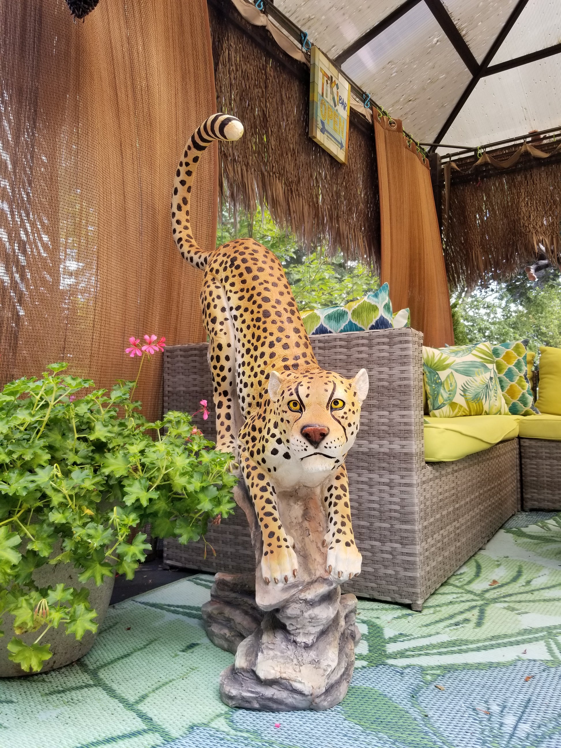 buy a cheetah statue at auction
