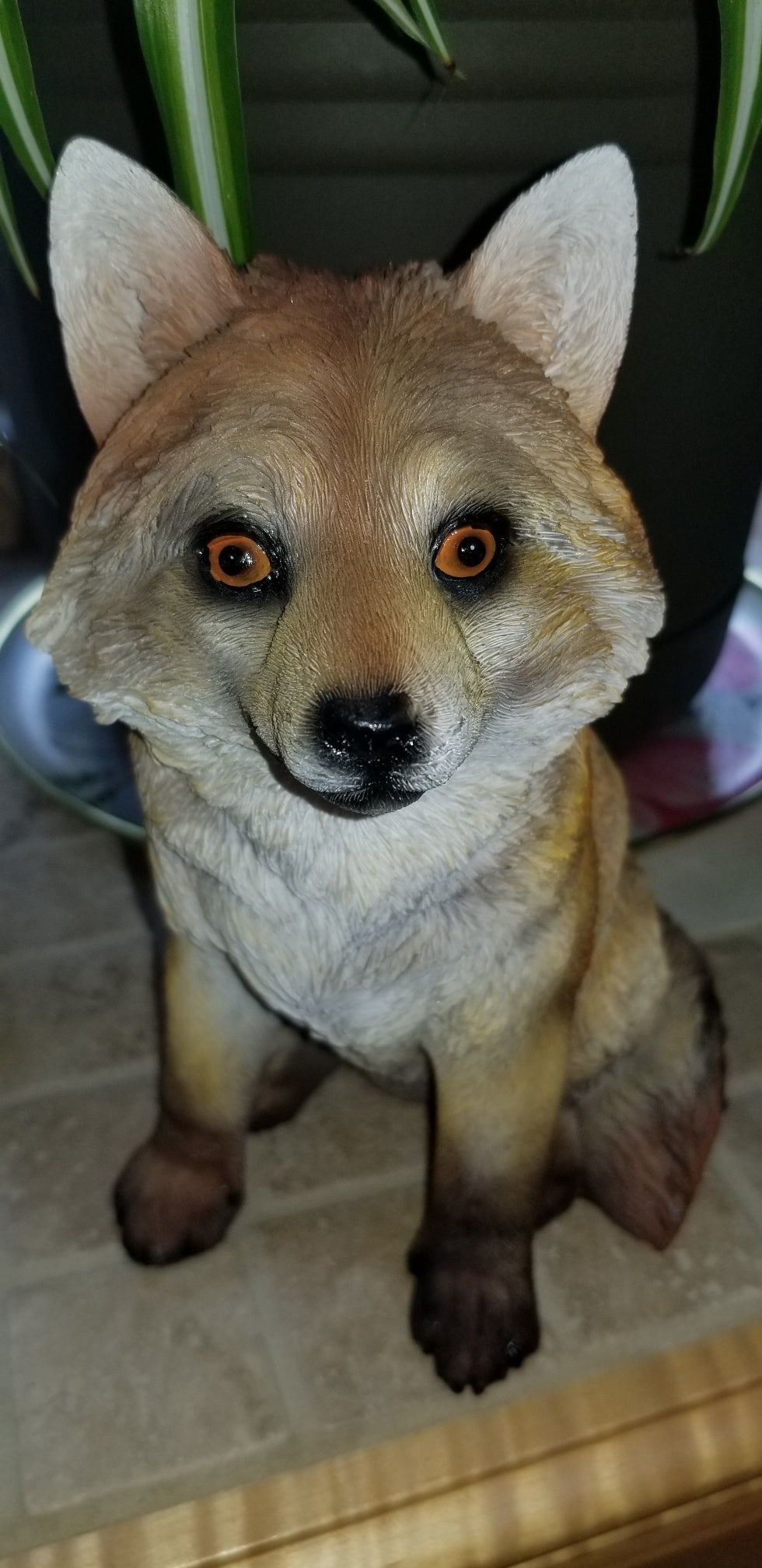 buy a sitting fox statue at auction