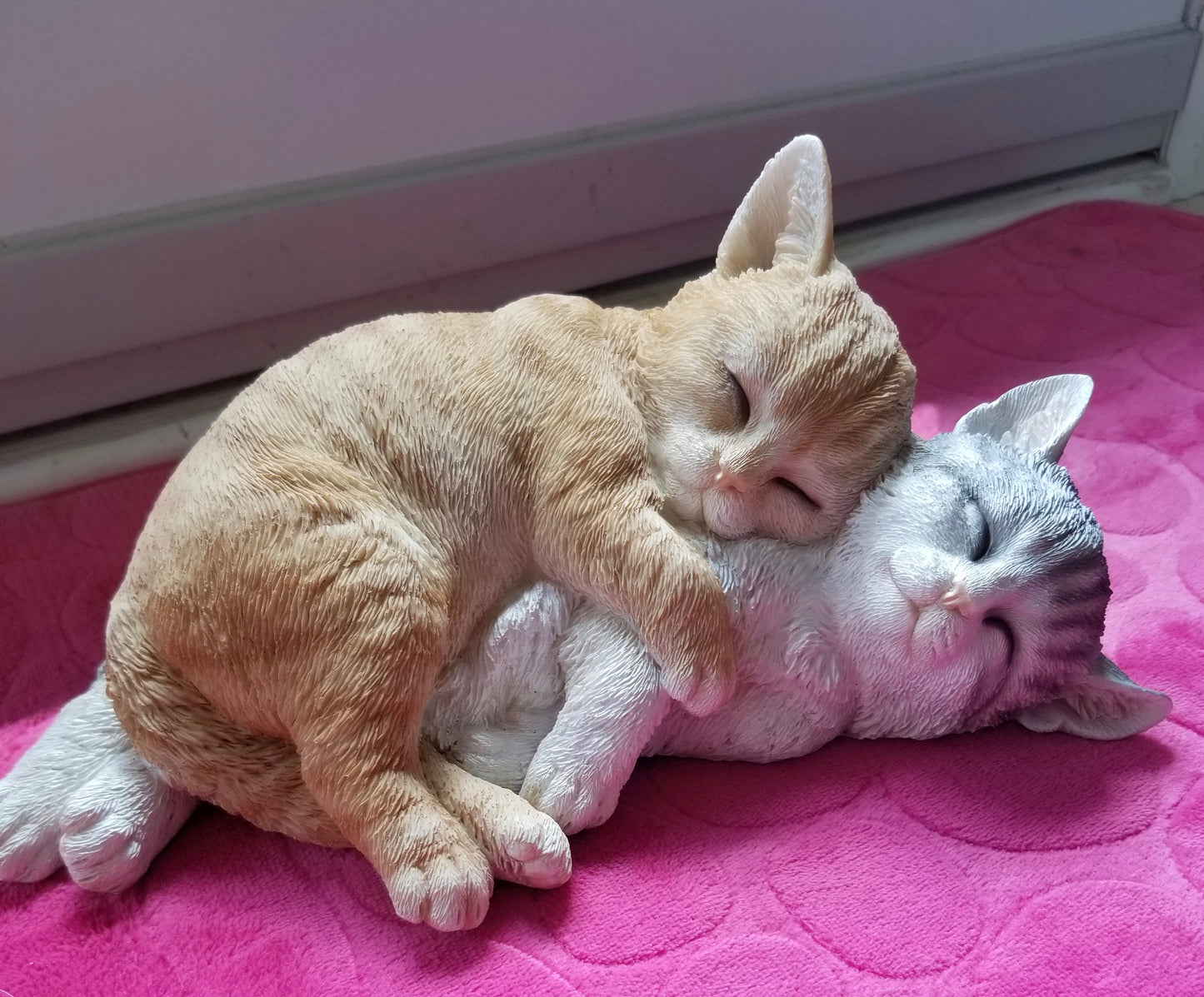 buy a sleeping cat pair statue at auction