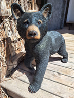 curious cub statue for sale