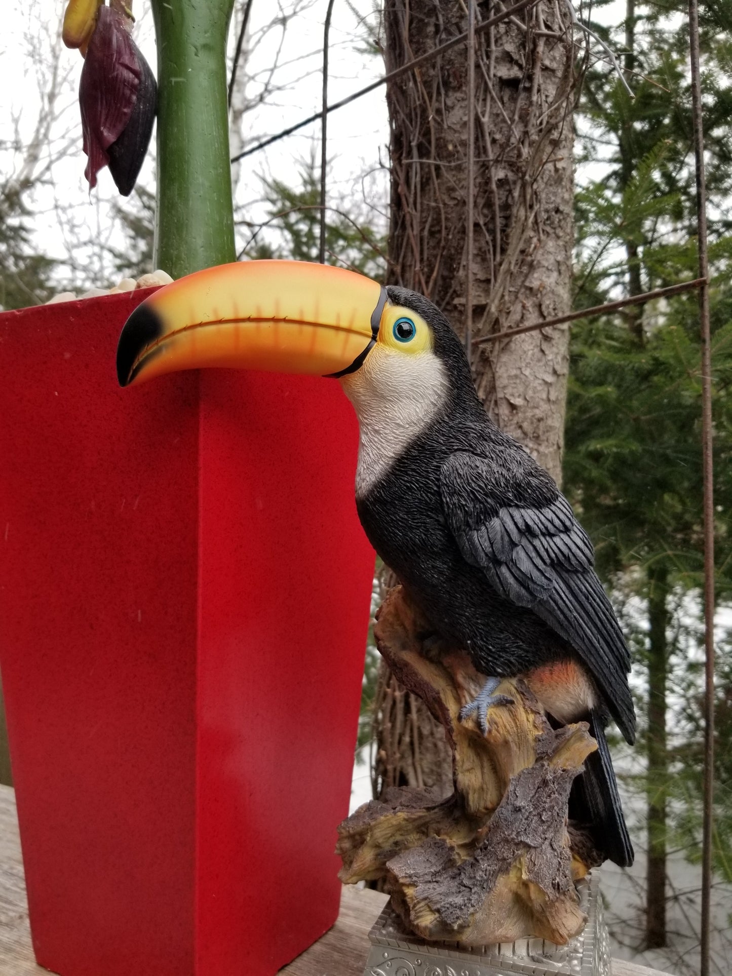 buy a toucan bird statue at auction
