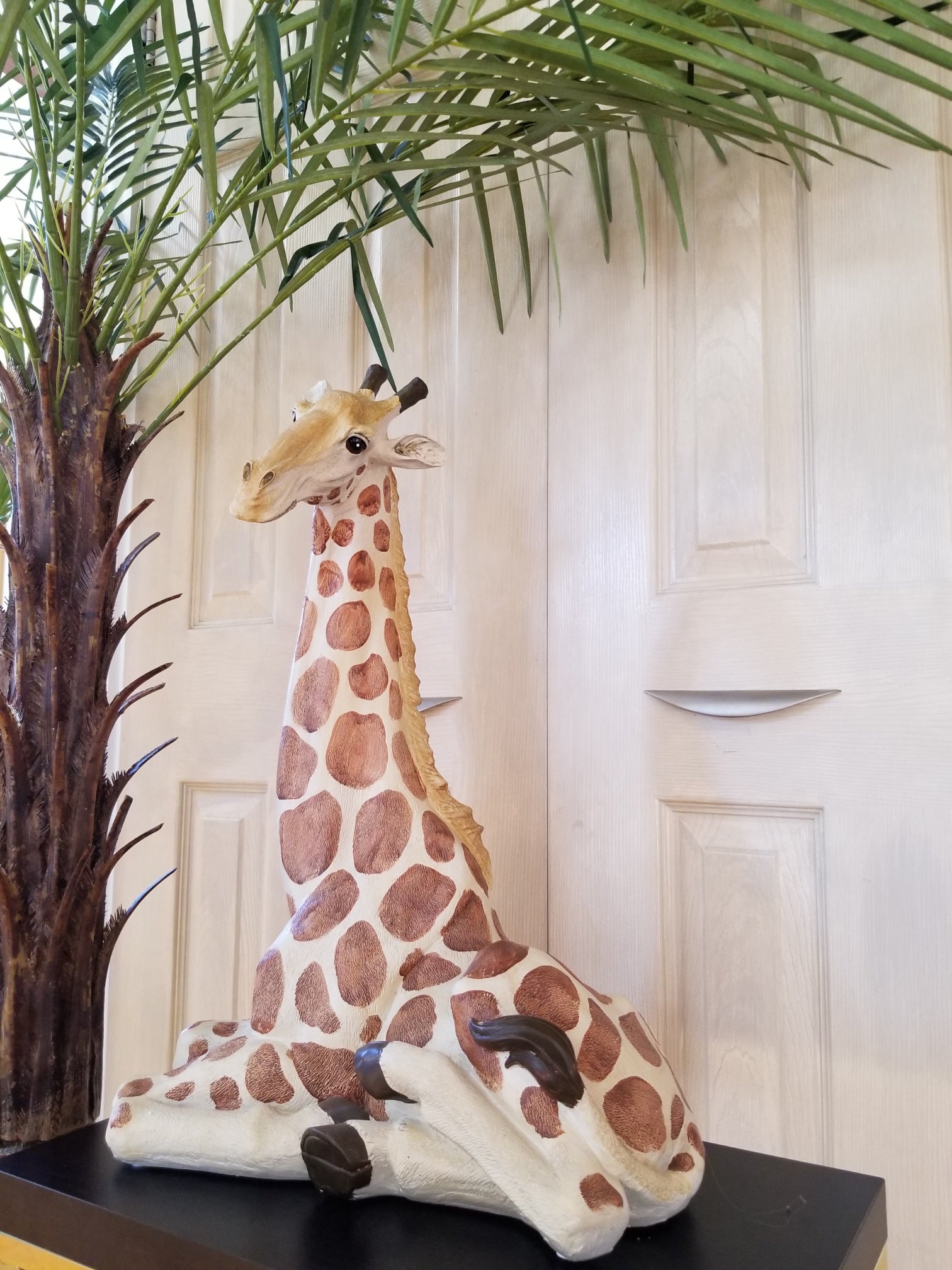 resting giraffe statue for sale