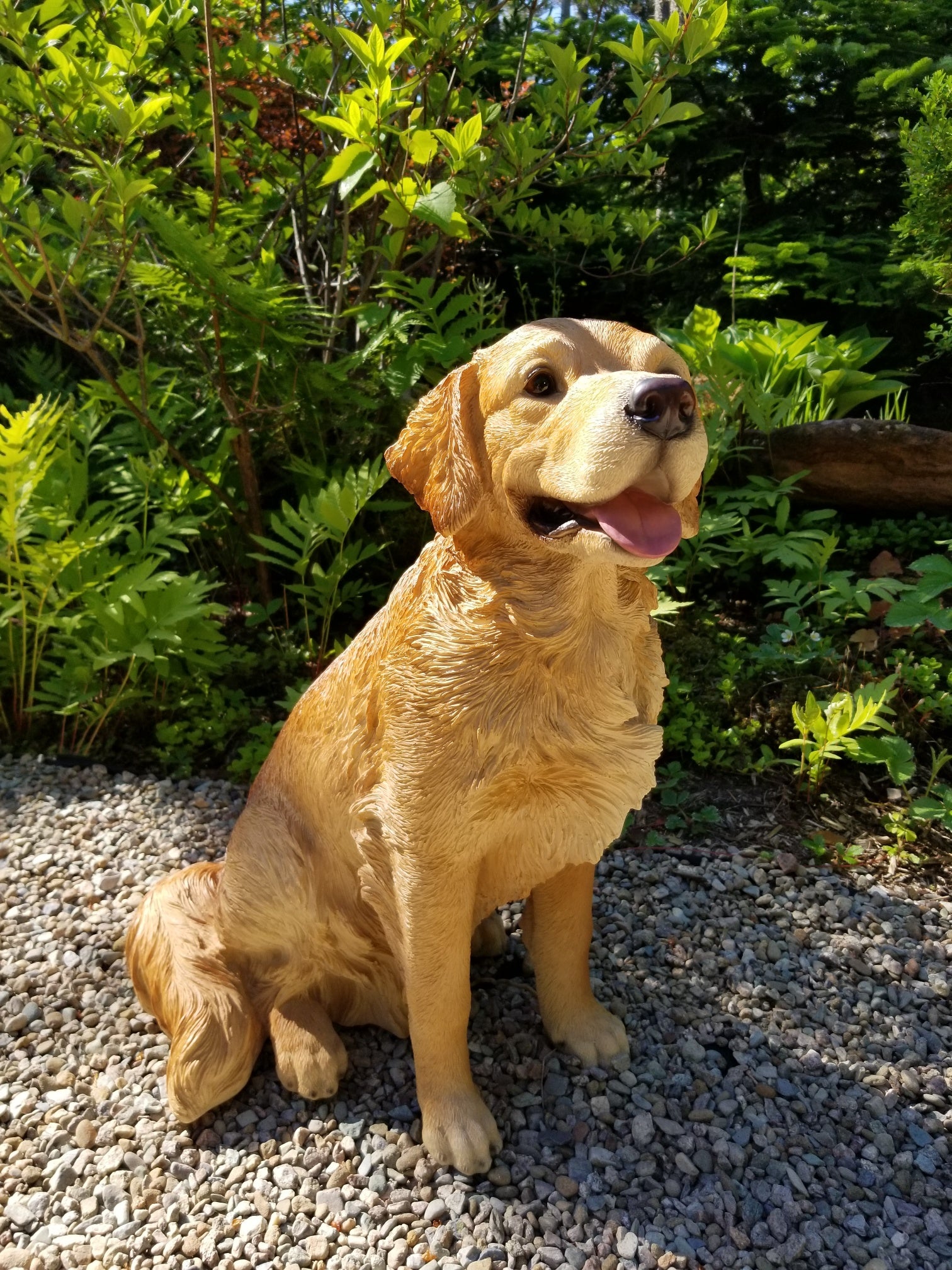 golden retriever dog statue sitting down pose