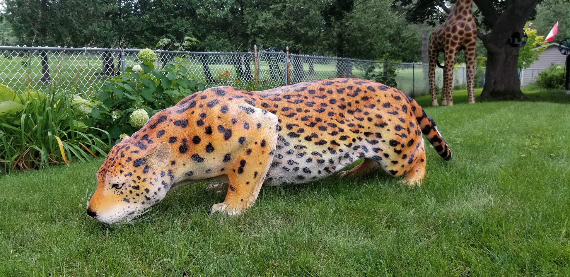 lifelike prowling jaguar statue