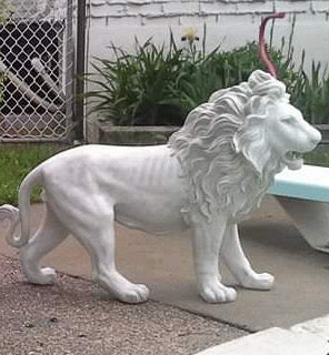 lion statue left foot extended